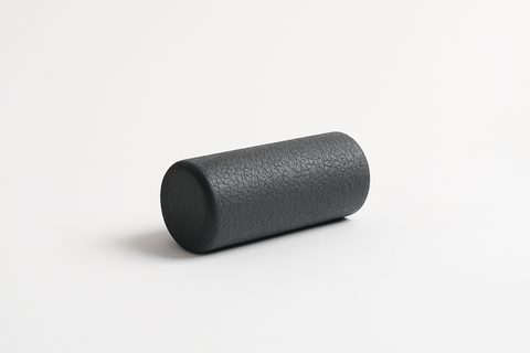 Smal foam roller at the center of a white background